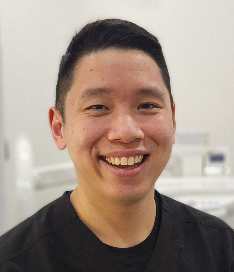 Headshot of Dr Alex Chin, Dentist at Plainland Dental.